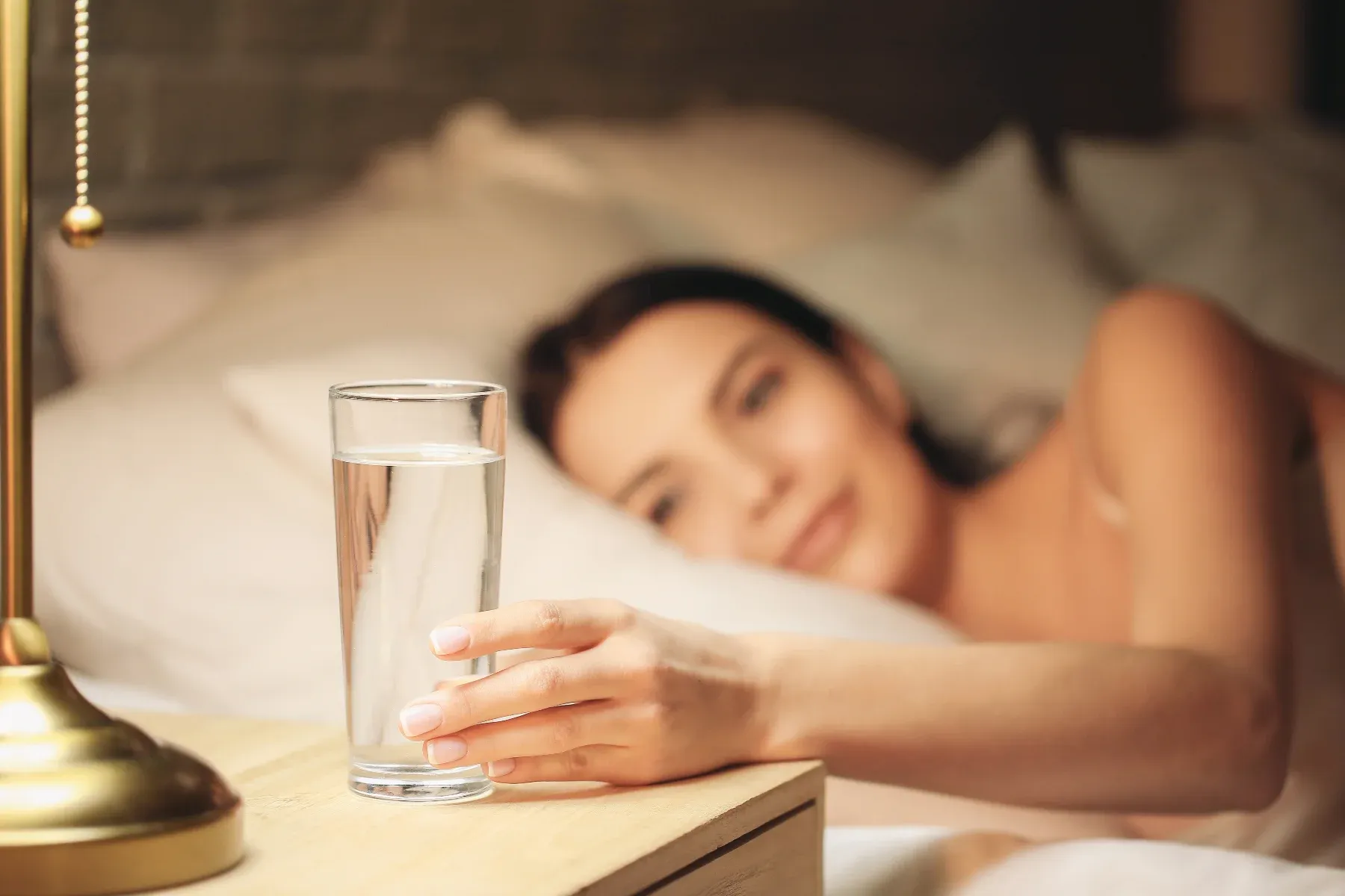 Should You Drink Water Before Bed? Pros & Cons