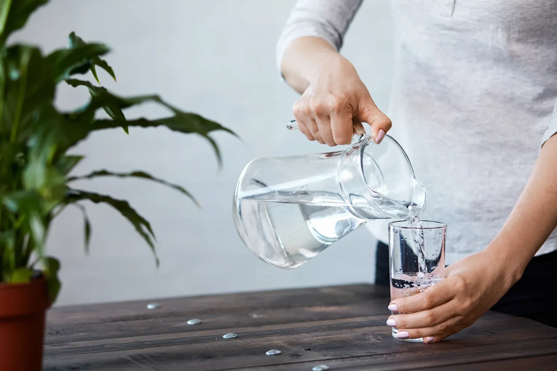 Pouring glass of water before bed