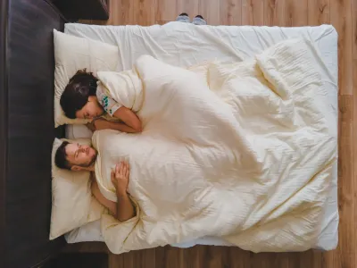 Couple sharing a bed